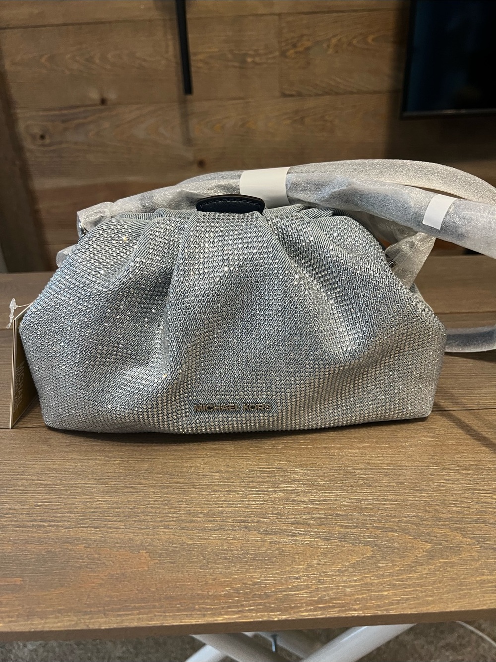NWT Michael Kors Nola light blue denim crystal embellished bag.